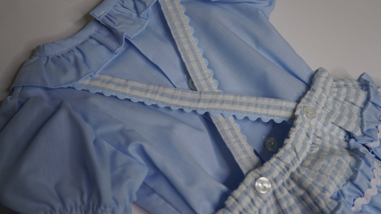 Light blue striped romper with bow